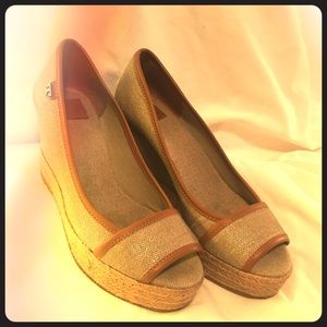 Tory Burch 3’1/2 inch wedge shoes.